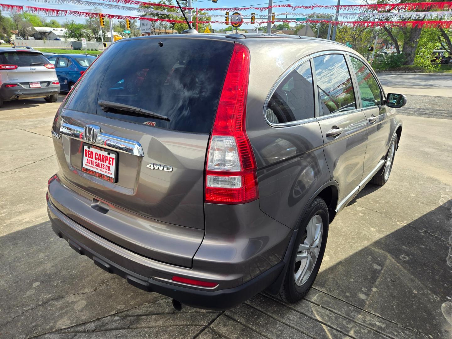 2010 Honda CR-V EX-L 4WD 5-Speed AT (5J6RE4H71AL) with an 2.4L L4 DOHC 16V engine, 5-Speed Automatic transmission, located at 503 West Court, Seguin, TX, 78155, (830) 379-3373, 29.568621, -97.969803 - Photo#2